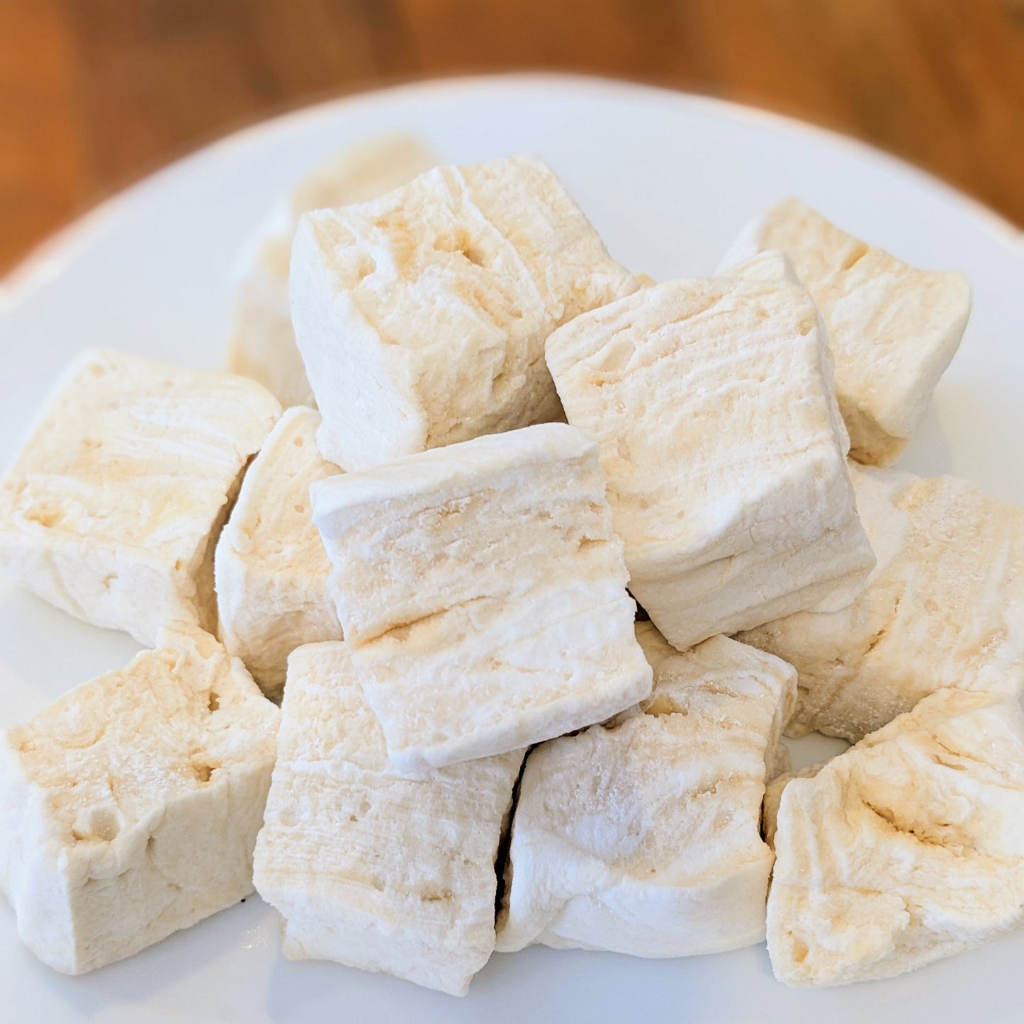 Pile of tahini marshmallows, on a white plate
